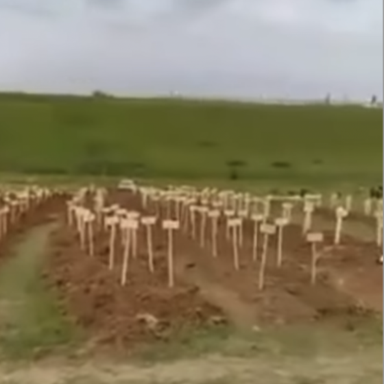 Russians Continue to Fill Mass Graves with Corpses of Ukrainians
