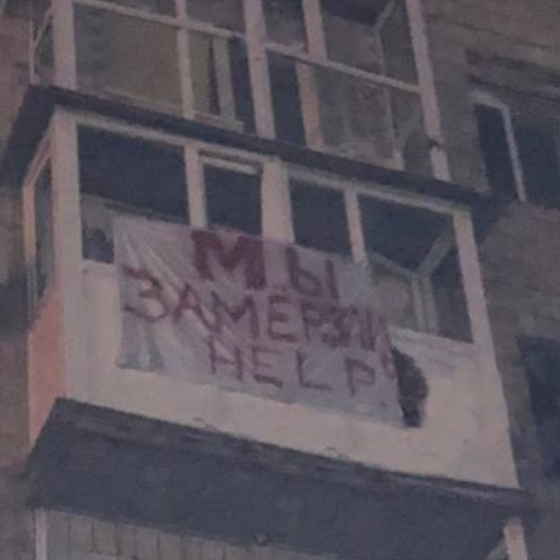 In Mariupol’s Burnt Brick Boxes Still Live People