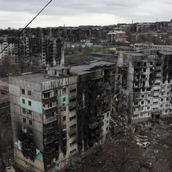 Residents of Mariupol Stand in Queue for Hours for a Plate of Porridge