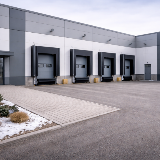 Clean modern industrial park facility exterior in Ukraine in winter daylight, dry ground, no text