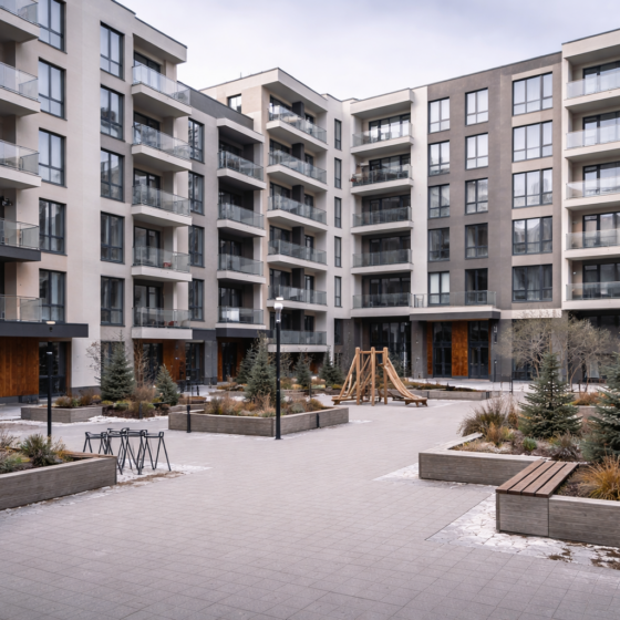 Newly completed residential complex exterior in Ukraine in winter daylight, dry pavement, no text
